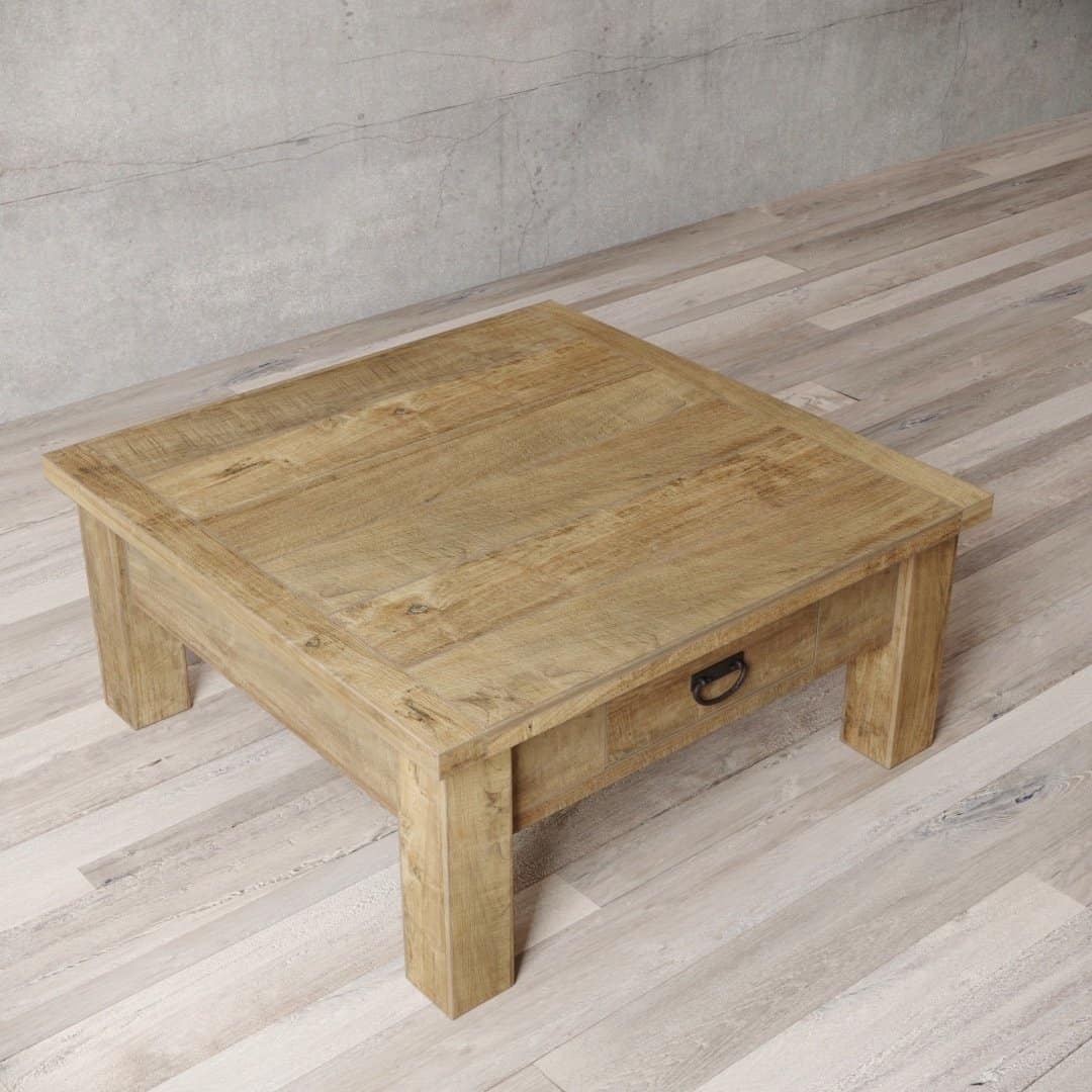 Urban Woodcraft 40 Riverbend Coffee Table - Natural (4) A Riverbend Coffee Table, featuring a wooden square design with a drawer, placed on a light-colored wooden floor.