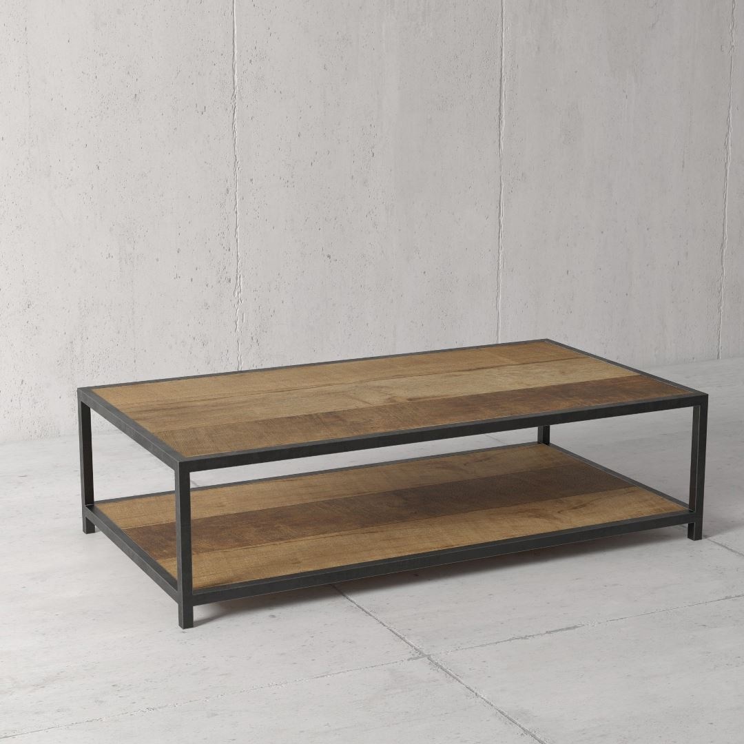 Urban Woodcraft 51_ Opus Coffee Table 3 The Opus Coffee Table, featuring a rectangular wooden top and shelf supported by a metal frame, is placed on a concrete floor against a plain grey wall.