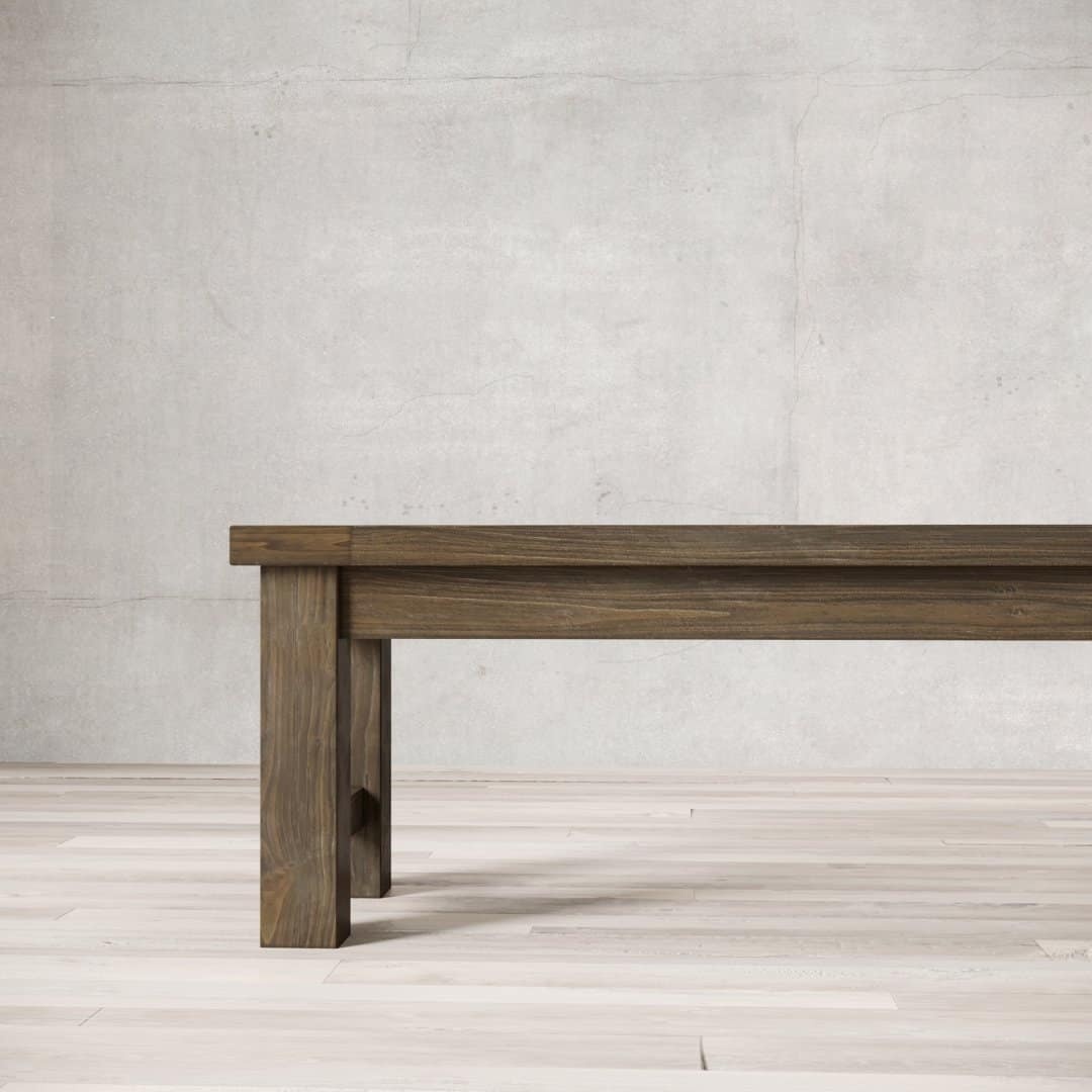 Urban Woodcraft 70 Squre Bench - Salvaged Espresso (5) A Square Dining Bench with square legs stands on a light-colored floor against a plain, neutral wall.