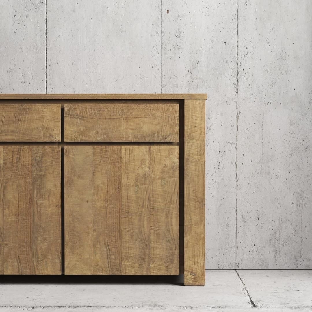 Urban Woodcraft 75 Teca Dining Buffet - Natural (4) The Teca Dining Buffet, showcasing a minimalist wooden design, stands against a concrete wall in a modern, industrial-style room.