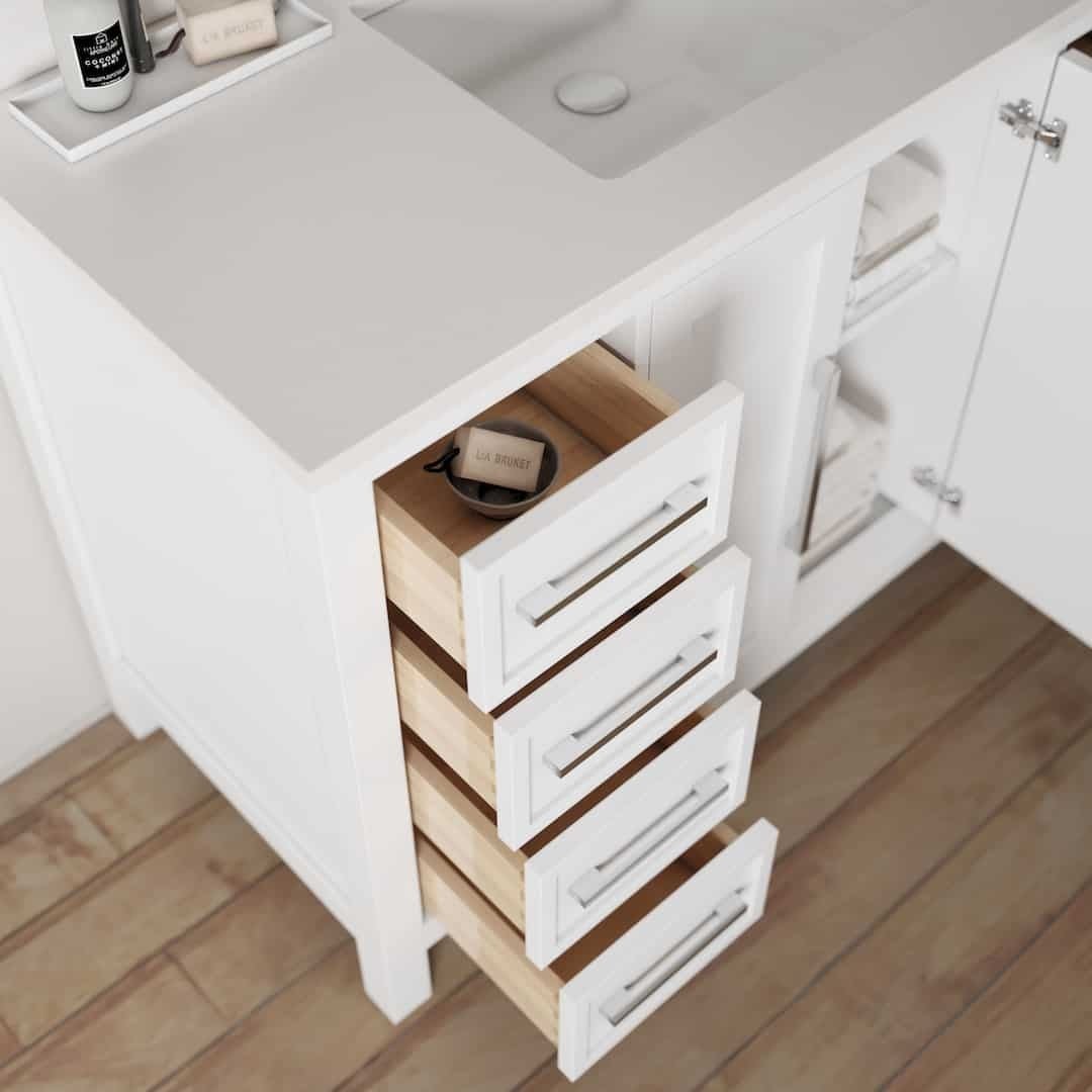 Urban Woodcraft Acadian 48in Single Bathroom Vanity White 5 Acadian 48" Single Bathroom Vanity with three open wooden drawers and one closed drawer, featuring a sink on the countertop and toiletries such as a brush and soap arranged on the surface.