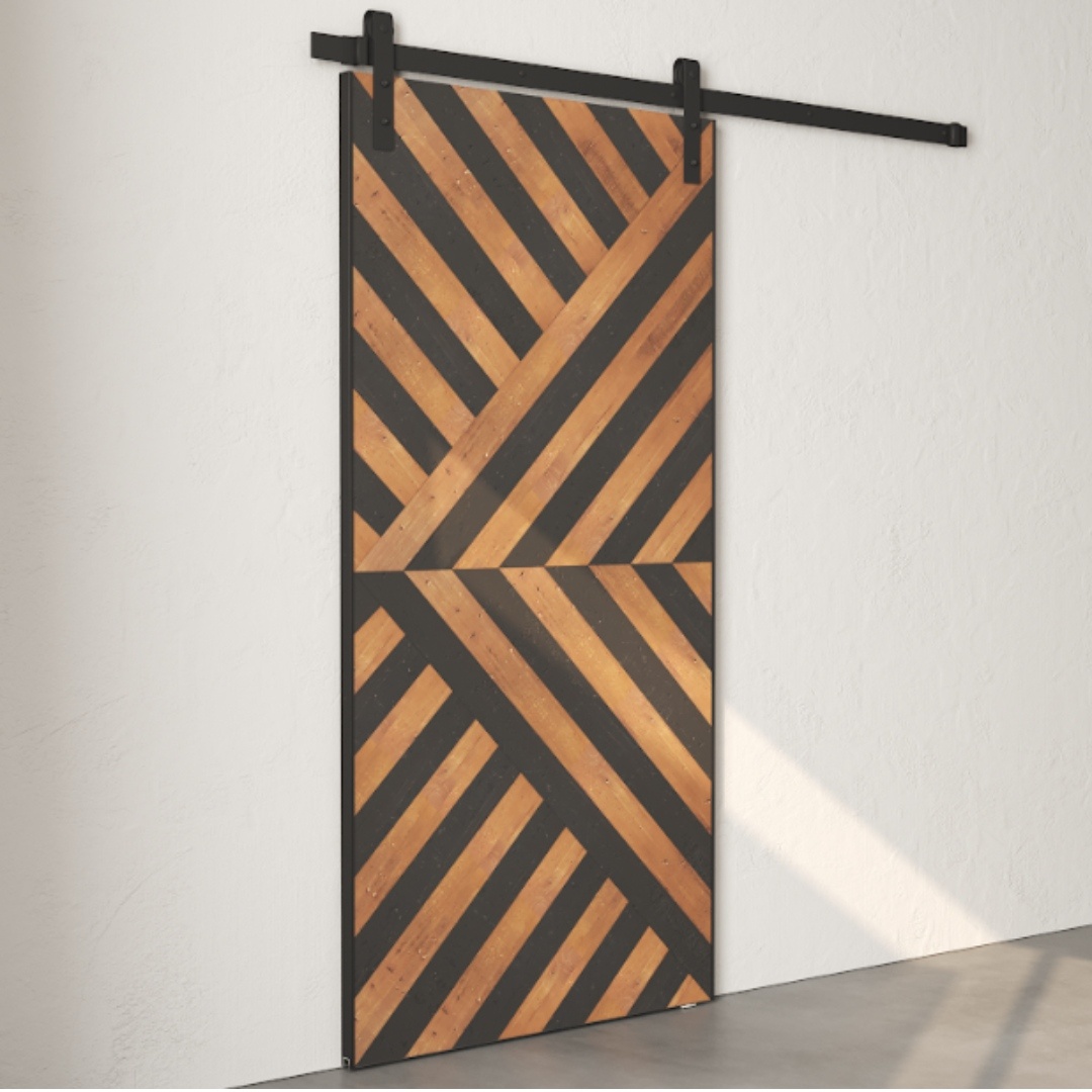 A sliding barn door with a reclaimed wood herringbone pattern in alternating espresso and black panels, installed on a wall with a metal track system, featuring the Celestia design.