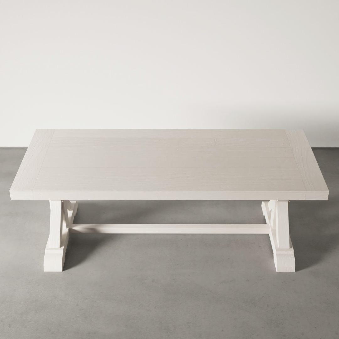 Madera Dining Table (Pure White) - 1 The Madera Dining Table - Pure White, featuring a rectangular white wooden top with a trestle base, is positioned against a plain white wall on a gray floor.