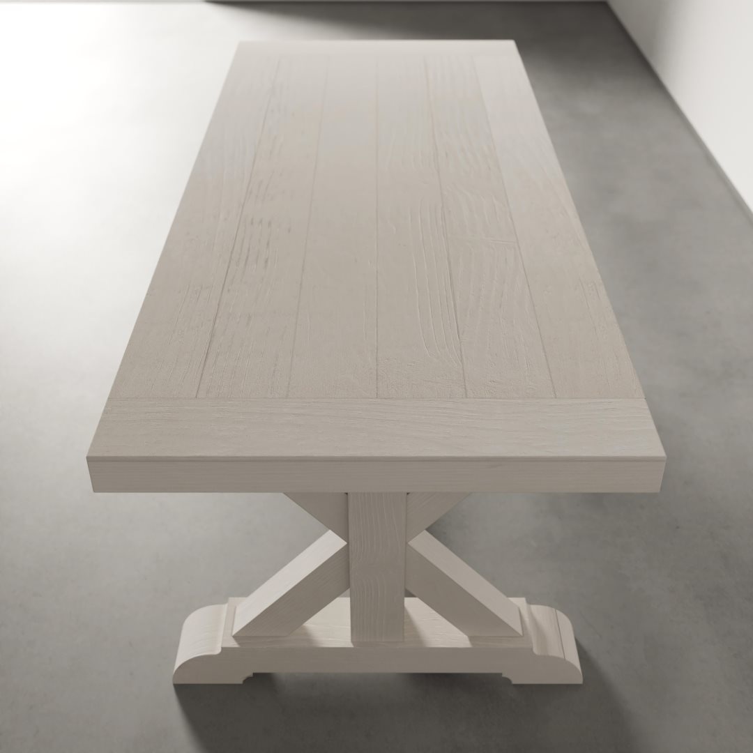 Madera Dining Table (Pure White) - 4 The Madera Dining Table - Pure White, featuring a rectangular wooden top and a sturdy, cross-braced base, sits on a grey concrete floor.