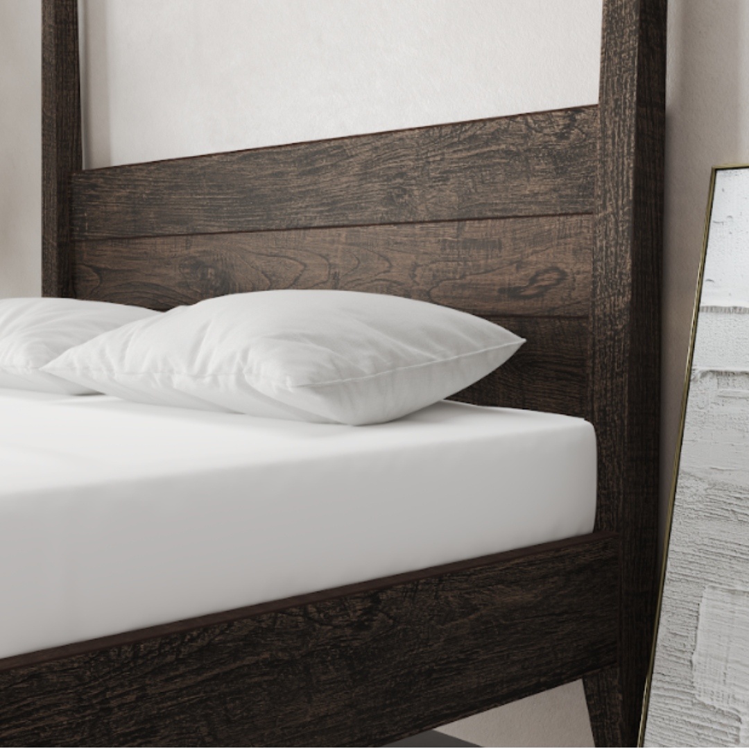 Riviera Bed Cafe Noire King _ Queen - 3 A Riviera Bed (Café Noire) with two white pillows and a white mattress, placed next to a floor-length mirror resting against the wall.