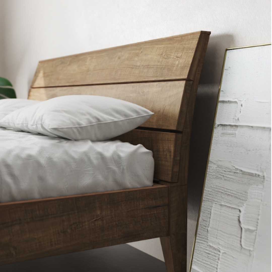 Tuscan Bed Natural King _ Queen - 3 The Tuscan Bed (Natural) with a slanted headboard, white pillow, and mattress is beside a large, framed, abstract white painting leaning against the wall.