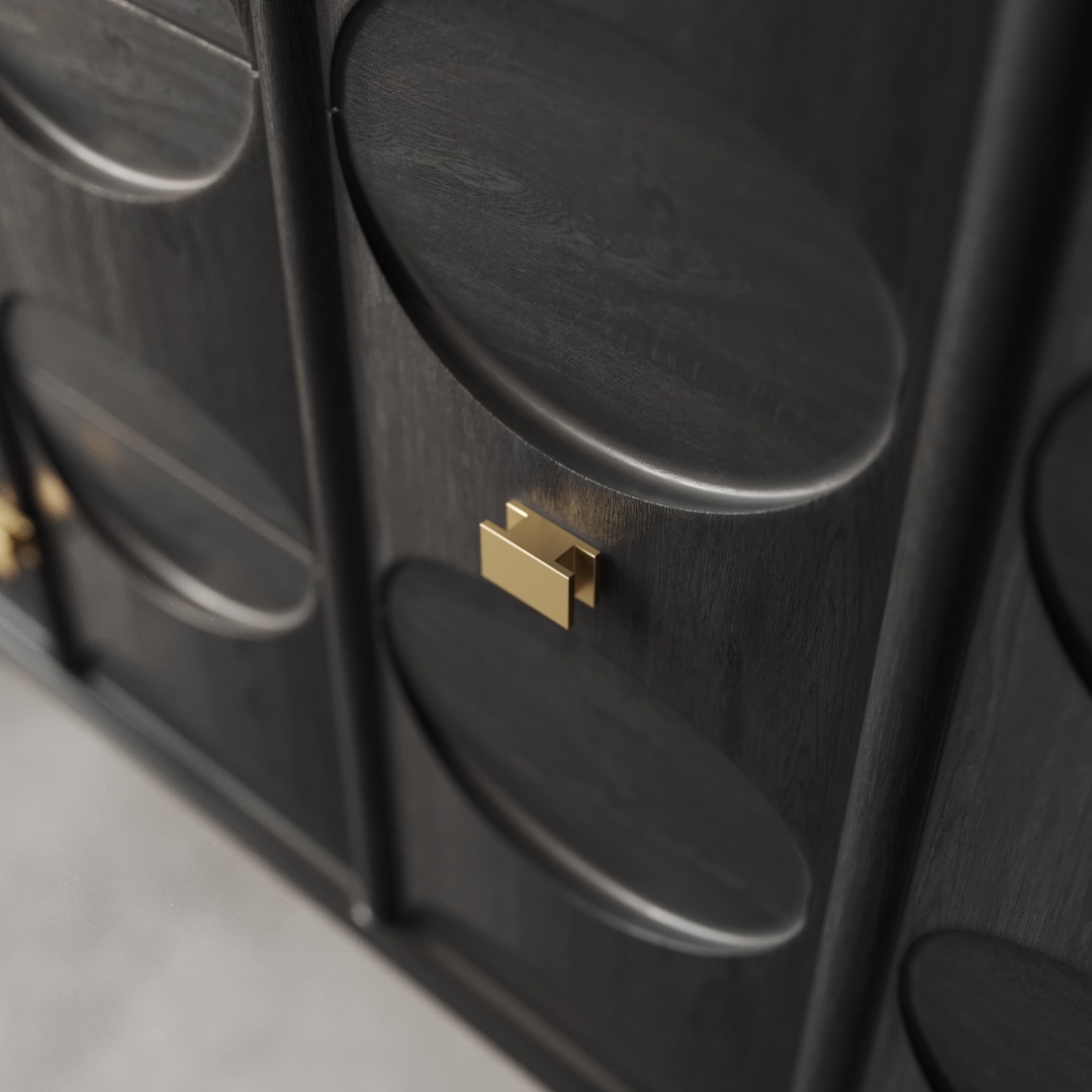 Alba 60 Side Cabinet-e Close-up of an Alba 60" Sideboard cabinet door with a dark wood finish, featuring large oval indentations and a rectangular brass handle.