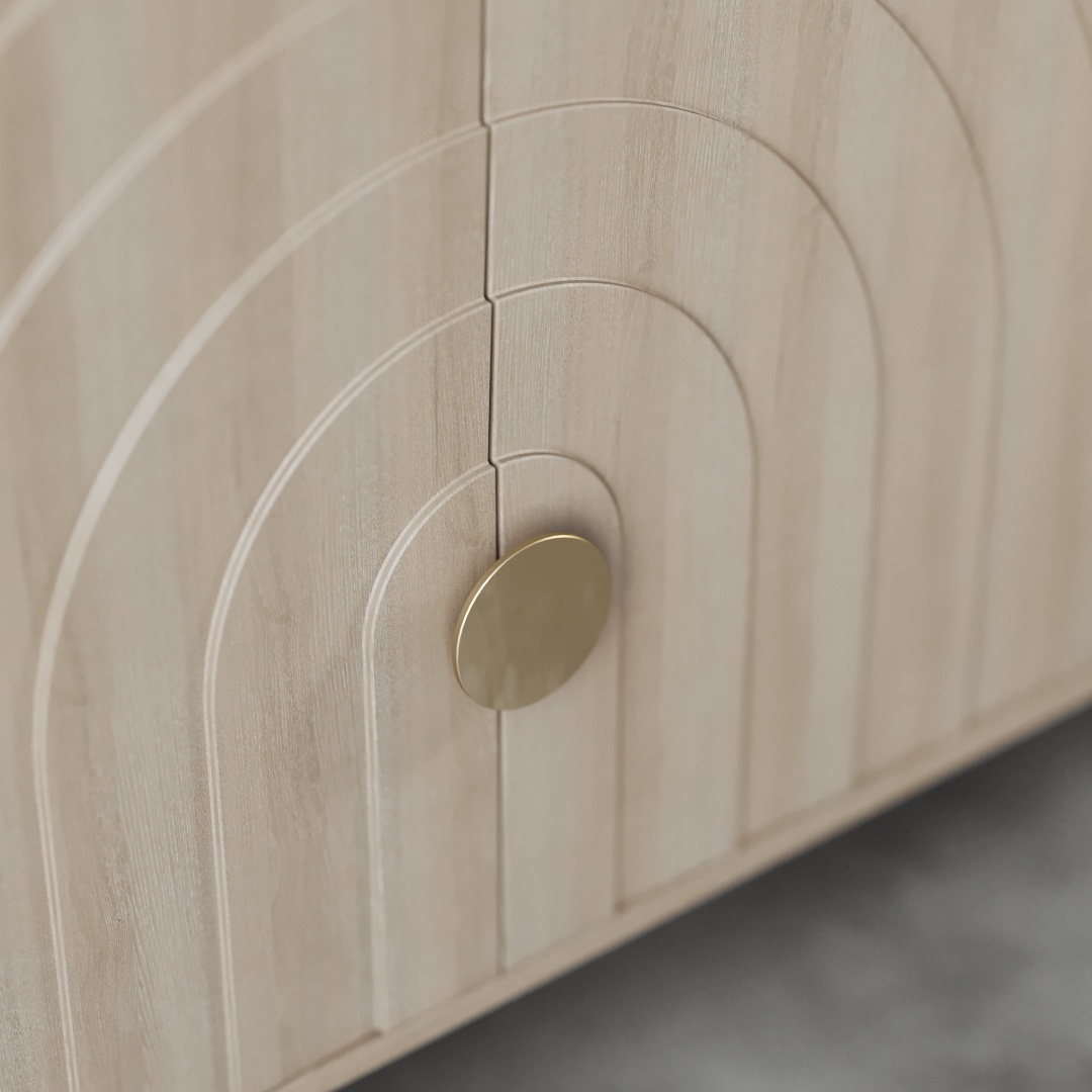 Azul 58 Side Cabinet-d Close-up of the Azul 58" Sideboard's wooden cabinet door, showcasing a round, gold-colored handle and an elegant arched design pattern.