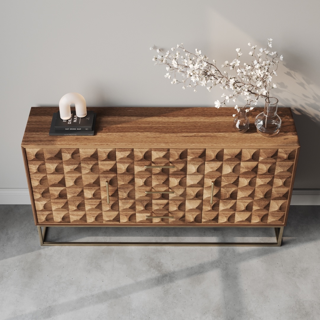 Wadi 57 Side Cabinet-d The Wadi 58" Sideboard, adorned with a geometric patterned front, features a book, a modern lamp, and a vase with white flowers on top.