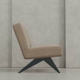 The Laurel 27" Lounge Chair features modern beige upholstery and angled black wooden legs, shown in profile against a textured light gray wall.