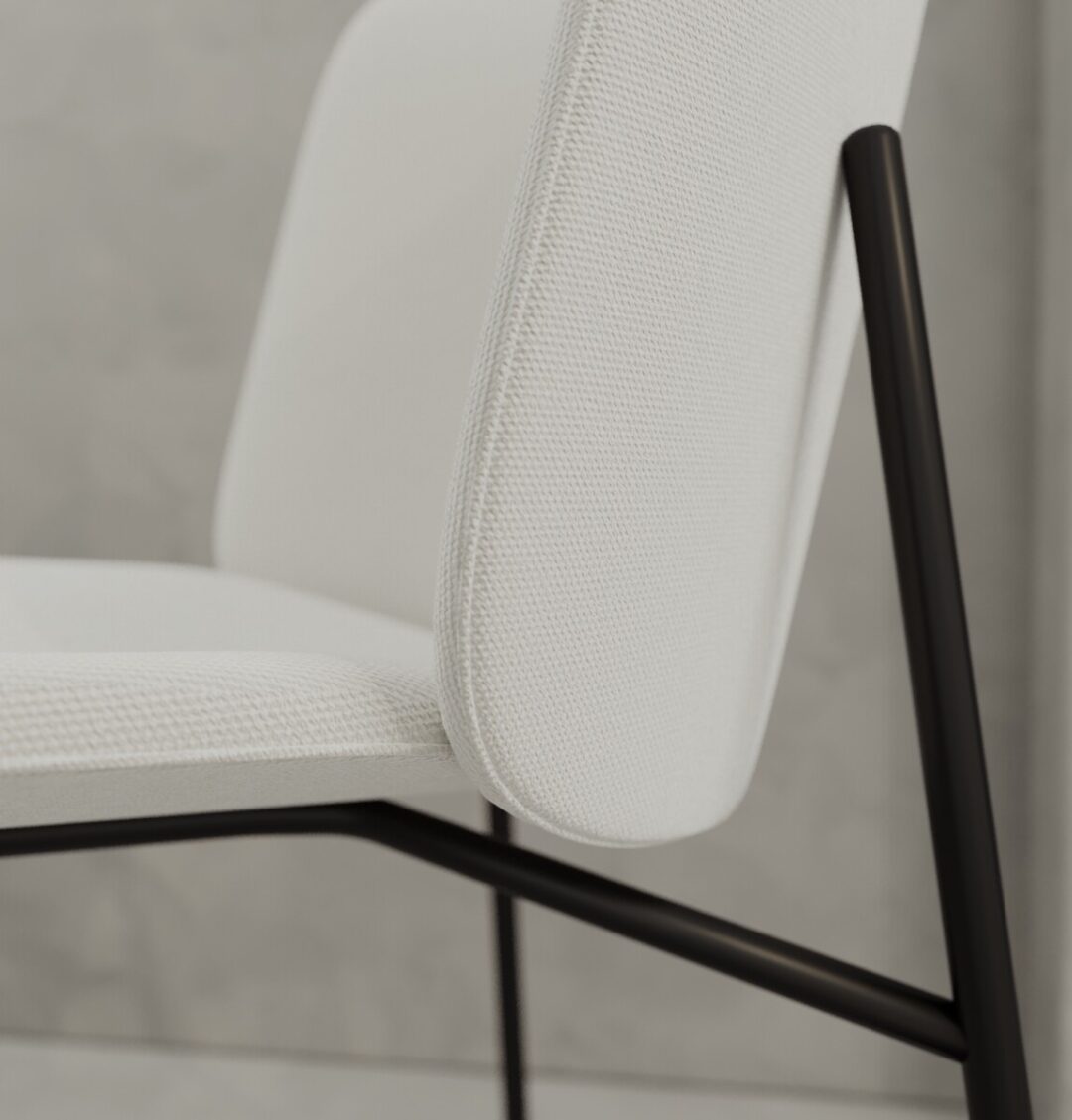 5 Kora Close-up of the Kora 20" Dining Chair, featuring a textured white seat and backrest with a black metal frame, set against a light gray background.