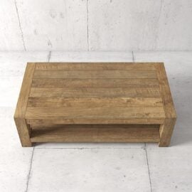 Rectangular wooden coffee table with a simple, rustic design, featuring a lower shelf for storage, set against a light-colored tiled floor and wall.