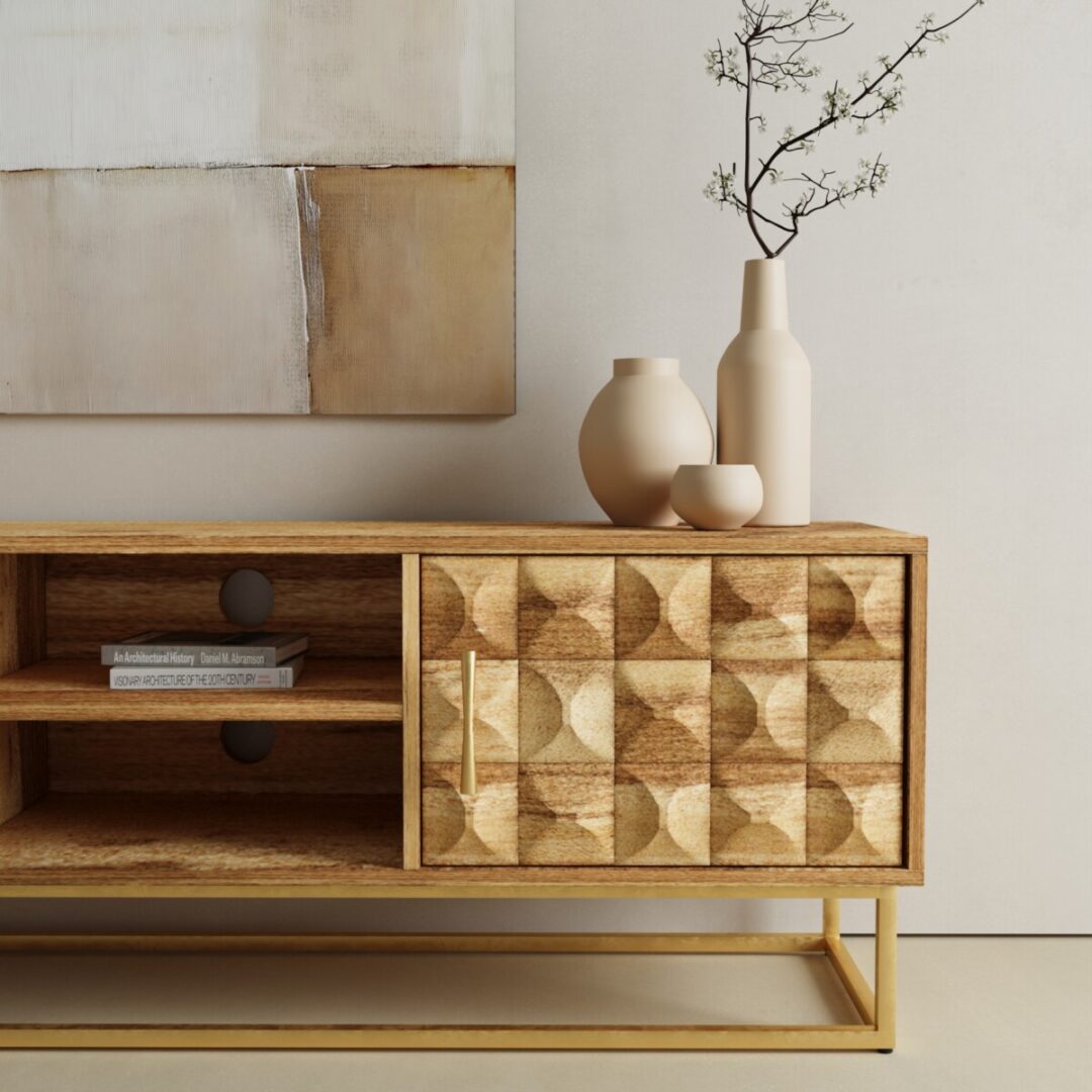 Wadi 55in TV Stand-03 The Wadi TV Stand features geometric-patterned doors, two open shelves, and is styled with vases and a branch on top; abstract art hangs above.