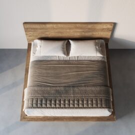 The Montara Bed features a wooden headboard, two white pillows, a beige blanket, and a quilted throw neatly arranged at the foot, all viewed from above.