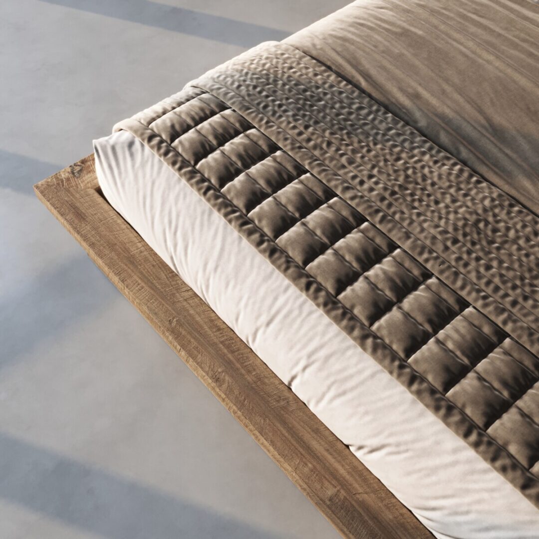 Montara King Bed-3 A close-up view of the Montara Bed, featuring a beige quilted blanket and textured bedspread on a wooden platform frame.