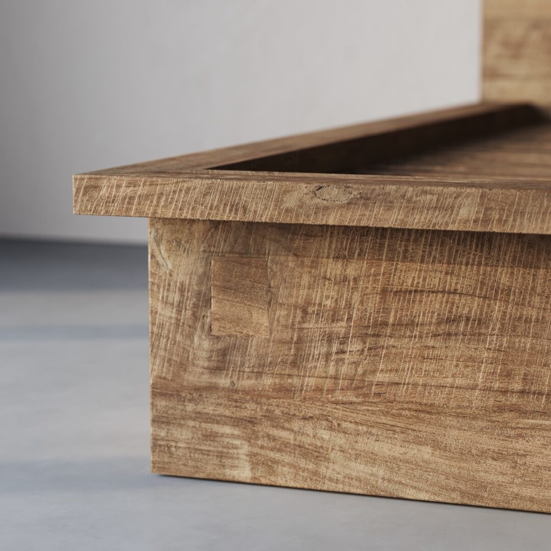 Montara King Bed-4 Close-up of the corner of the Montara Bed, showcasing its natural, textured wooden finish against a plain background.